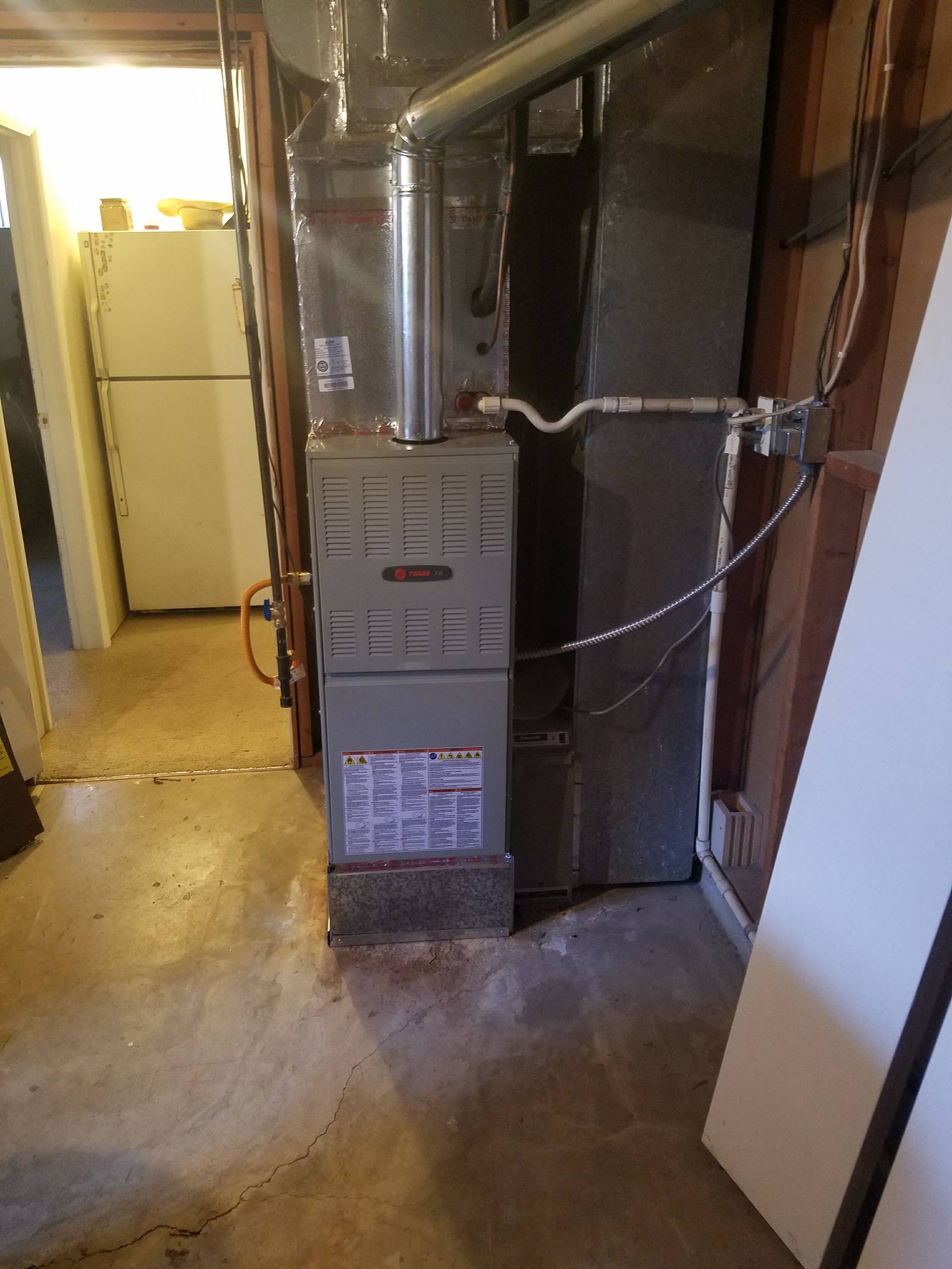 Furnace replacement: Trane furnace installed with sealed ductwork in a Colorado basement